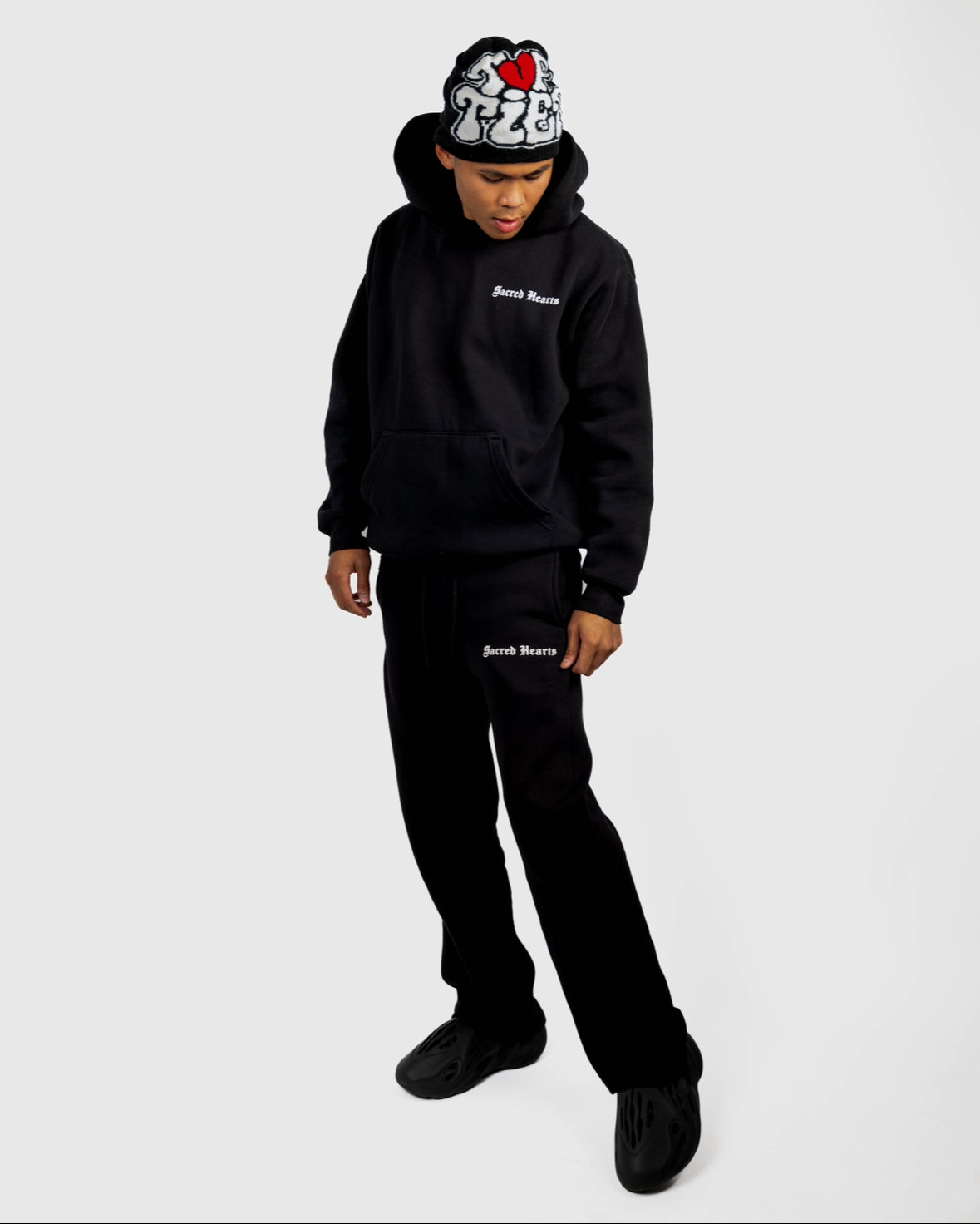 SACRED HEARTS FLARED SWEATS